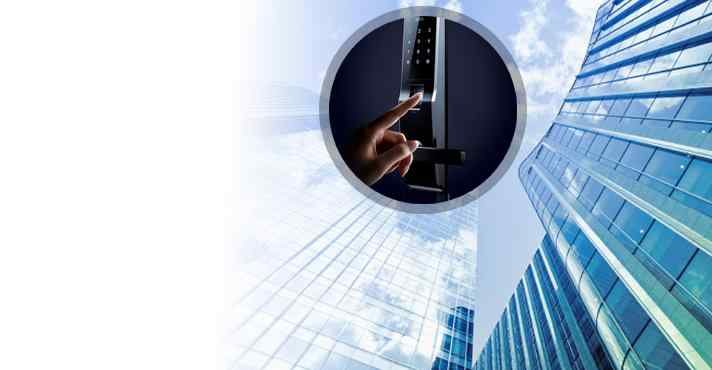 Commercial locksmith working on a business door in Yelm Washington
